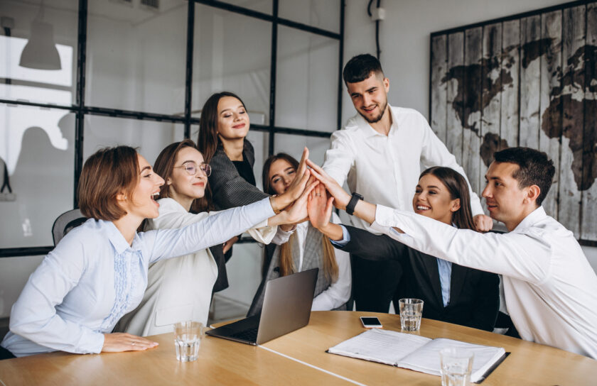 Group of people working out business plan in an office